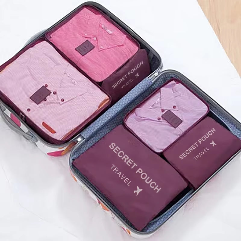 6-Piece Set of Large Capacity Waterproof Travel Storage Bags in Pink, Blue, and Grey with Zipper Closure for Clothing and Underwear